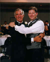 FatherSonHug.jpg (94002 bytes)